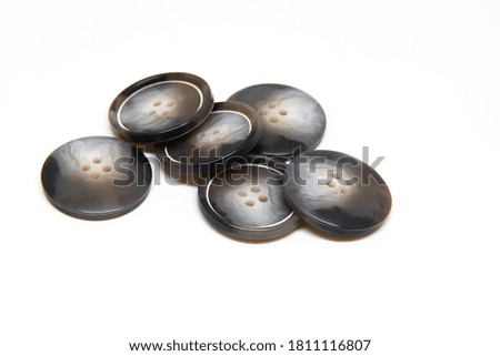 Buttons for clothes on white background using for concept of Button Day.