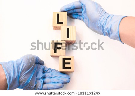 words on wooden cubes, white background. medical concept