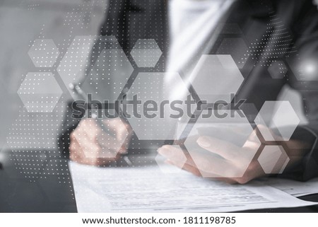 Abstract moder technology theme hologram and a woman signing contract use phone. Multiexposure.