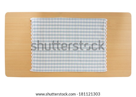 Tablecloth on wooden table isolated on white background