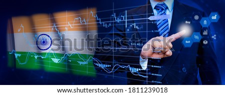 Businessman touching data analytics process system with KPI financial charts, dashboard of stock and marketing on virtual interface. With India flag in background.
