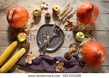 Thanksgiving Day. Thanksgiving pumpkin on a wooden background. autumn holiday. Dinner. thanksgiving. View from above. Copspace