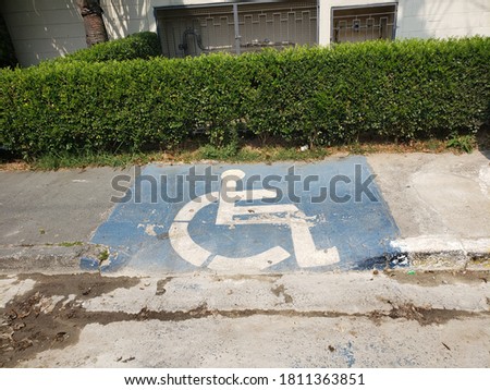 Sidewalk recessed for disabled wheelchair