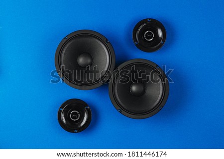 Car audio, car speakers, on a blue background. Copy space