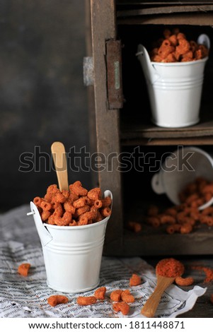 Spicy Crispy Macaroni, Popular Snack in Bandung, Indonesia. Made from Fried Macaroni with Spicy Spice Powder. Known as Makaroni Ngehe