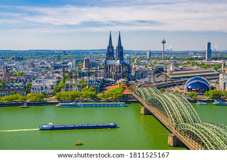 Aerial view of Cologne cityscape of historical city centre with Cologne Cathedral, central railway station Hauptbahnhof and Hohenzollern Bridge across Rhine river, North Rhine-Westphalia, Germany Royalty-Free Stock Photo #1811525167