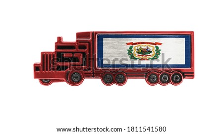 Toy truck with State of West Virginia flag shown isolated on white background. The concept of cargo transportation between countries.