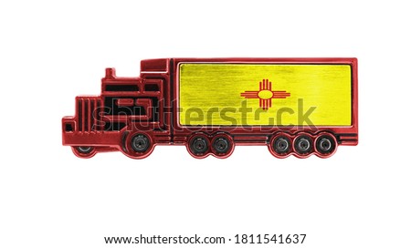 Toy truck with State of New Mexico flag shown isolated on white background. The concept of cargo transportation between countries.