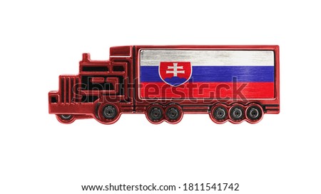 Toy truck with Slovakia flag shown isolated on white background. The concept of cargo transportation between countries.