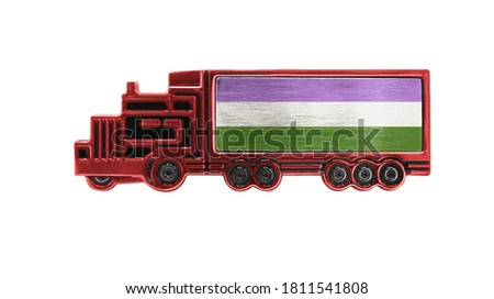 Toy truck with genderqueer pride flag shown isolated on white background. The concept of cargo transportation between countries.