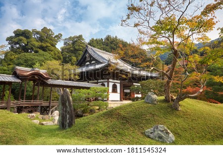 Kaizando memorial Hall in the tsukiyama style garden  featuring a pond, man made hills, decorative rocks, pine and maple trees at Kodai-ji (Kodaiji-jushozenji) Zen Buddhist Temple. Kyoto. Japan
