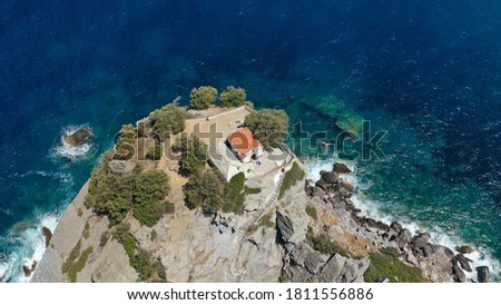 Aerial drone photo of picturesque chapel of Saint John built in famous cliff where Mamma Mia movie was filmed, Skopelos island, Sporades, Greece