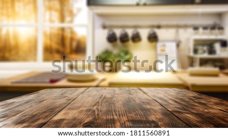 Table background of free space and window in home interior 