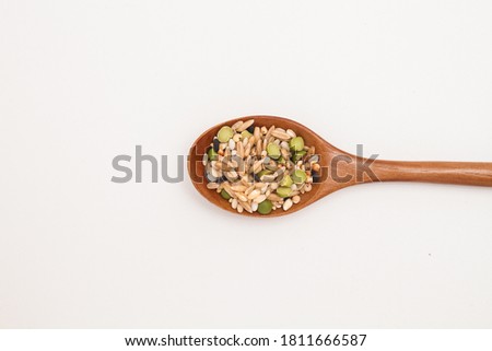 Wooden spoon with Miscellaneous grains
 Royalty-Free Stock Photo #1811666587
