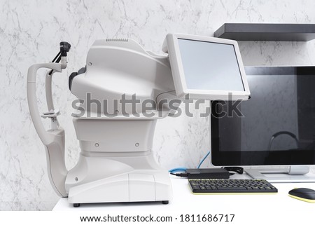 Angiography. Optical CT scan. Ophthalmology clinic equipment. Diagnosis of vision. Tomography in Optical Coherence (OCT) close-up. Royalty-Free Stock Photo #1811686717