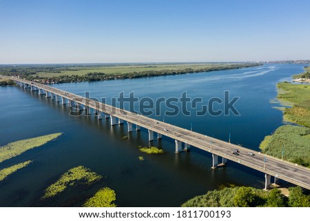 The Antonovskiy bridge in Kherson city aerial view Royalty-Free Stock Photo #1811700193