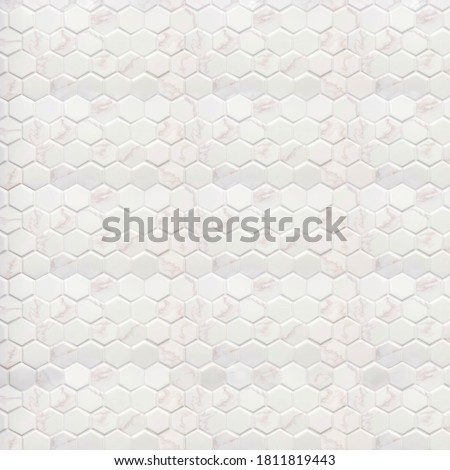 White ceramic marble tile wall decorative with hexagon pattern close up. Honeycomb ceramic bright color in geometric shape texture floor used for kitchen or bathroom interior design 3d