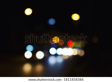 Blur picture of light street lamp and light from car bokeh at night in Samut Prakan