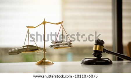 Golden scales and judge hammer and justice law ideas