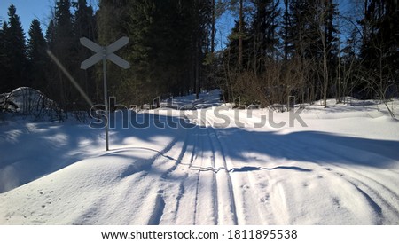 The cross-country ski trail crosses the level crossing