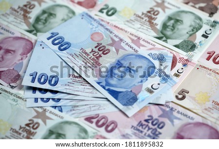 Banknotes of Two Hundred Turkish Liras on the other banknotes Royalty-Free Stock Photo #1811895832
