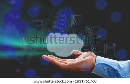 Hand of young business man with computer signs