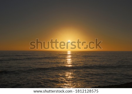 A beautiful sunset over the ocean at Sunset Cliffs in California. Magic hour sky.