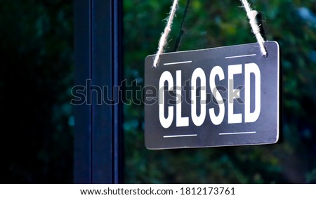 Shop closed of storefront sign, restaurant shows the closing status.Thai language in the picture means 'Closed' in English.