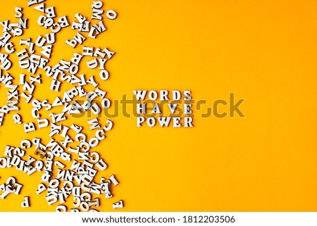Quote WORDS HAVE POWER made out of wooden letters on bright yellow background. Motivational Words Quotes Concept Royalty-Free Stock Photo #1812203506