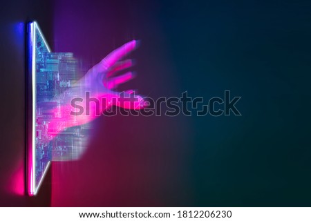 Future technology cyberpunk neon color concept. Mobile phone with city and artificial intelligence hand hologram for digital technology. Background copy space on right side. Royalty-Free Stock Photo #1812206230