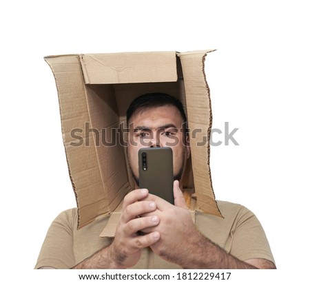 serious man with box instead of his head . photographer take photo on mobile phone. isolated on white wall background. empty copy space for inscription.