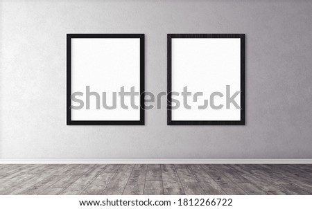 2 white posters with big black frame on wall. Mockup for you design.