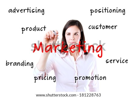 Young business woman writes on the screen marketing. Isolated on white.
