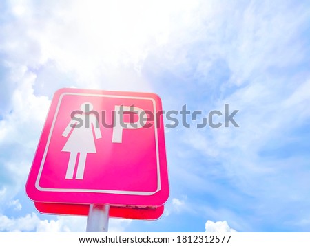 Pregnant woman parking sign,Sign of the parking lot on the sky background