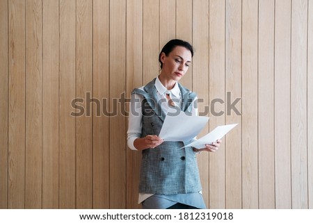 Business woman reading paper document stock photo
