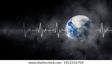 Ecology and Healthcare Concept : Blue planet earth with white pulse line and smoke in black background. (Elements of this image furnished by NASA.)