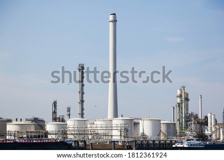 Oil refinery in Amsterdam. Tanks and lines for oil storage and processing. Dutch oil industry.