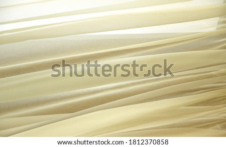 Abstract soft yellow lemon background made of light fabric