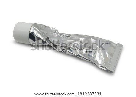 old  cream tube  on a white background,with clipping path Royalty-Free Stock Photo #1812387331