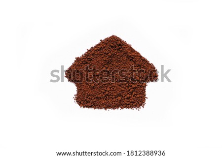 House shape of coffee powder on white background