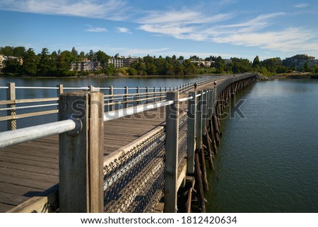   Galloping Goose Trail Bridge Victoria. The Galloping Goose Trail is a 55 kilometer multi use trail between Sidney and Sooke on southern Vancouver Island. This is the Selkirk Trestle portion over the Royalty-Free Stock Photo #1812420634