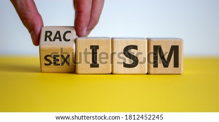 Cube form the words 'racism' and 'sexism'. Royalty-Free Stock Photo #1812452245