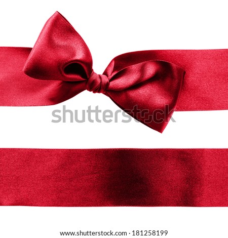 Red decorative satin ribbon with a bow on white background