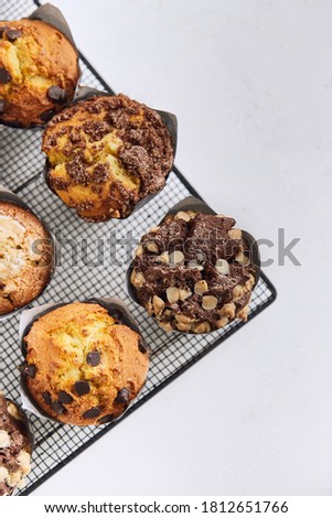 chocolate muffin with chips, pear crumble and cookies