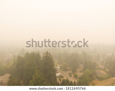 Smoke from a burning forest in a town, burning forests in Oregon, Washington and California. The danger
