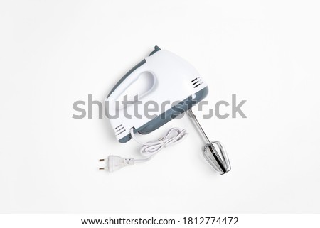 Electrical hand mixer isolated on a white background.High resolution photo.