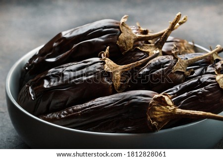 Oven baked eggplant, cooked aubergine. Selective focus Royalty-Free Stock Photo #1812828061