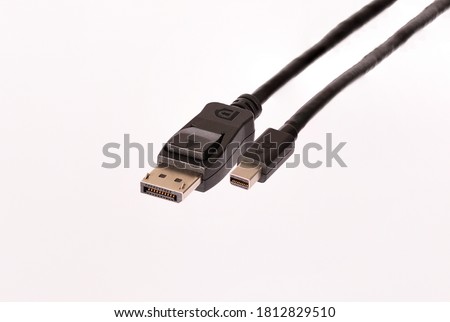 DP cable on the white background, close up. Royalty-Free Stock Photo #1812829510