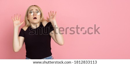 Young woman on pink background, copyspace