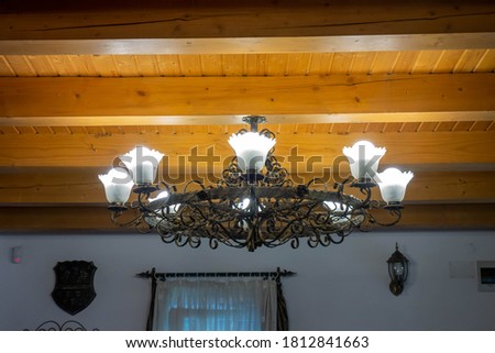 
old traditional wrought iron chandelier